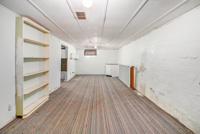 finished below grade area featuring carpet flooring