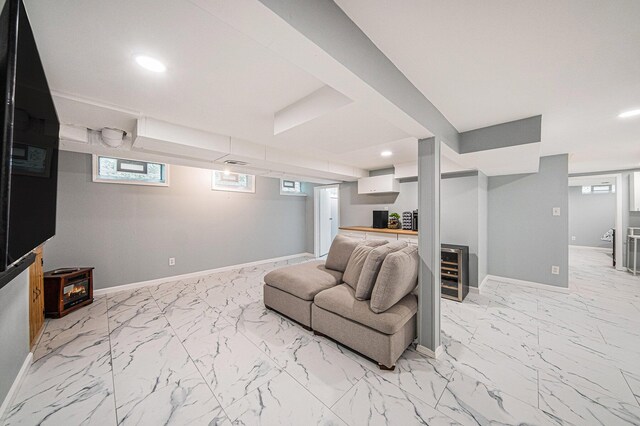 3630 Charter Pl, Ann Arbor, MI 48105 - living area featuring light marble finish floors, baseboards, plenty of natural light, and recessed lighting