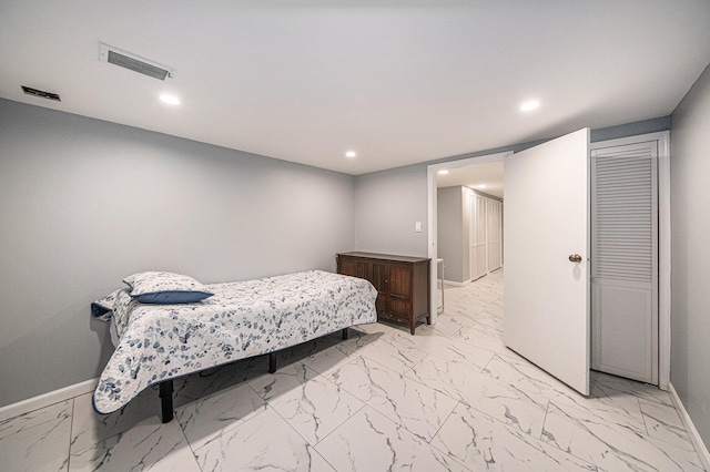 3630 Charter Pl, Ann Arbor, MI 48105 - bedroom with baseboards, light marble finish flooring, and recessed lighting