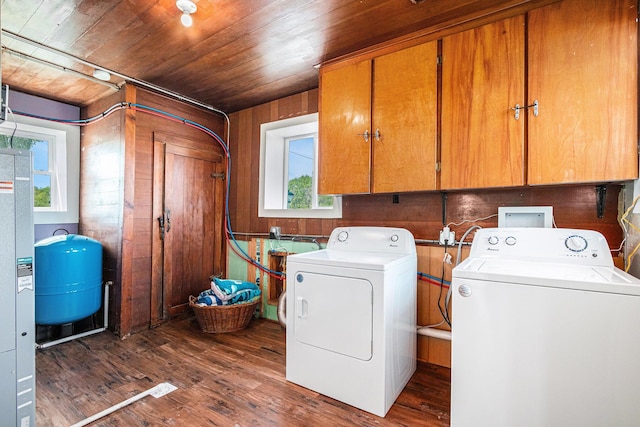 8700 E Napier Ave, Benton Harbor, MI 49022 - laundry area featuring independent washer and dryer, cabinet space, plenty of natural light, wood ceiling, and wood finished floors