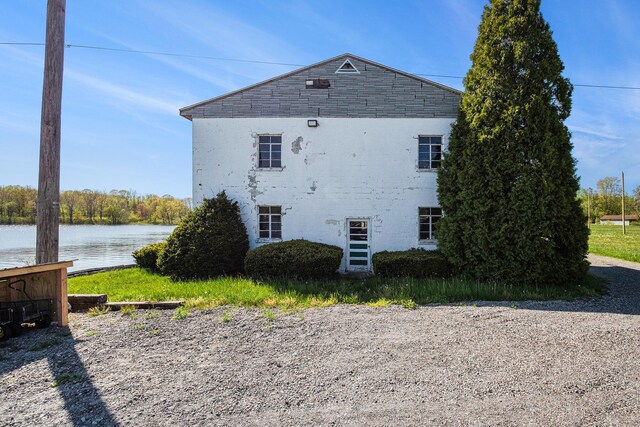 8700 E Napier Ave, Benton Harbor, MI 49022 - view of home's exterior with a water view