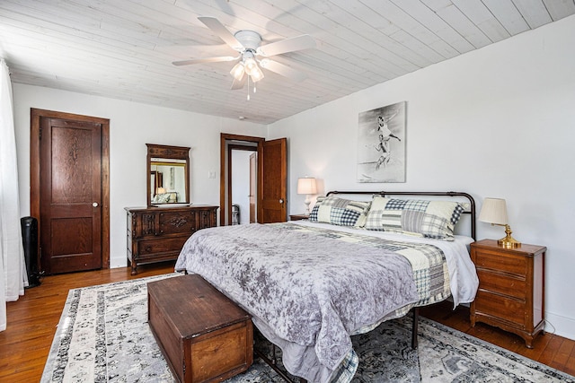 8700 E Napier Ave, Benton Harbor, MI 49022 - bedroom with wood finished floors, wood ceiling, and a ceiling fan