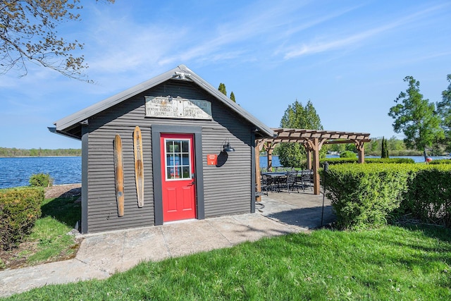 8700 E Napier Ave, Benton Harbor, MI 49022 - view of outbuilding featuring a pergola, an outbuilding, and a water view
