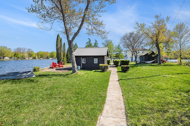 8700 E Napier Ave, Benton Harbor, MI 49022 - view of green lawn with a water view and an outbuilding