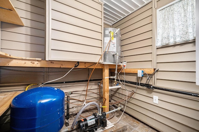 3309 Dumont Lake Dr, Allegan, MI 49010 - detailed view of a water pressure tank and water heater