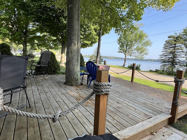 6439 E Sugar Grove Rd, Fountain, MI 49410 - wooden terrace featuring a water view