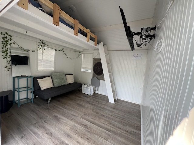 6439 E Sugar Grove Rd, Fountain, MI 49410 - interior space featuring wood finished floors and a chandelier