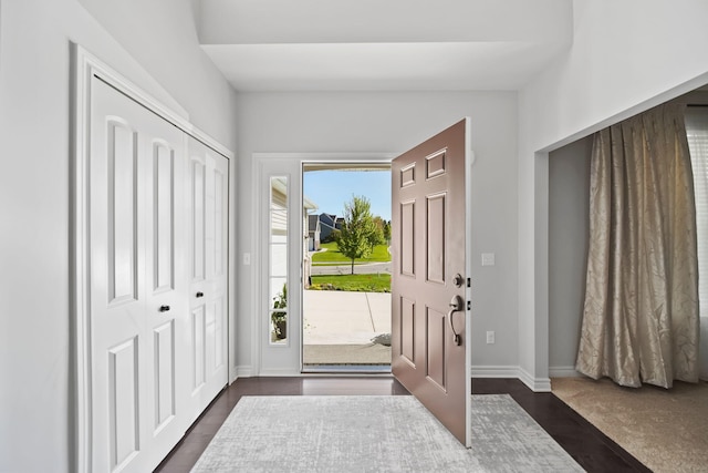 10478 River Edge Rd, Saline, MI 48176 - foyer featuring baseboards and dark wood-type flooring