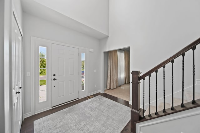 10478 River Edge Rd, Saline, MI 48176 - entrance foyer featuring stairs, wood finished floors, and baseboards