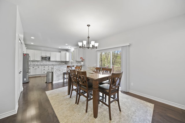 10478 River Edge Rd, Saline, MI 48176 - dining room with a chandelier, baseboards, dark wood-style flooring, and recessed lighting