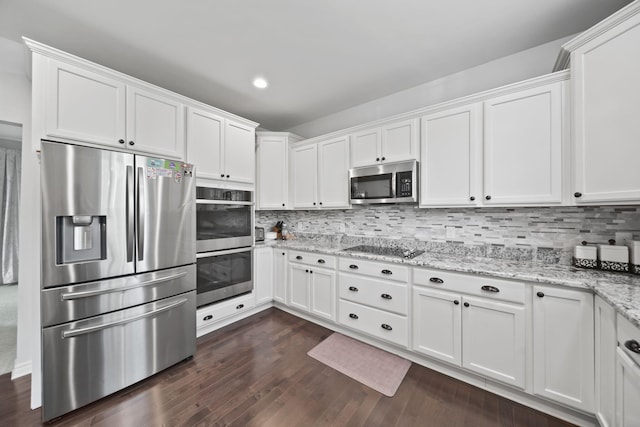 10478 River Edge Rd, Saline, MI 48176 - kitchen featuring stainless steel appliances, white cabinetry, decorative backsplash, and recessed lighting