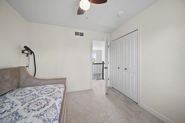 10478 River Edge Rd, Saline, MI 48176 - bedroom with carpet flooring, baseboards, a closet, and ceiling fan