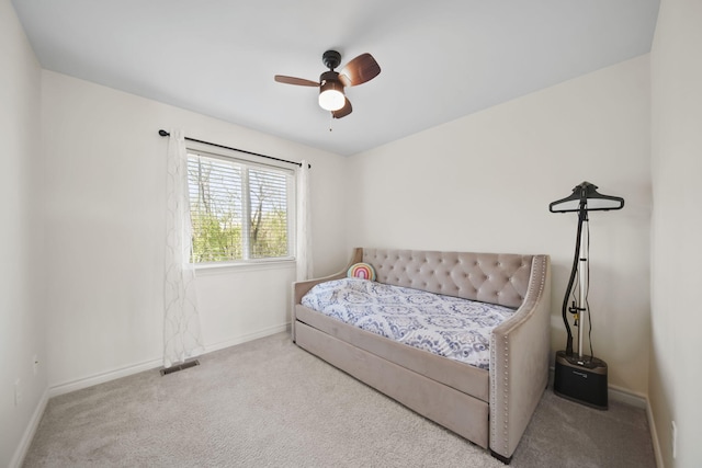 10478 River Edge Rd, Saline, MI 48176 - carpeted bedroom with baseboards and a ceiling fan