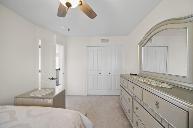 10478 River Edge Rd, Saline, MI 48176 - bedroom with light colored carpet, a closet, a ceiling fan, and baseboards