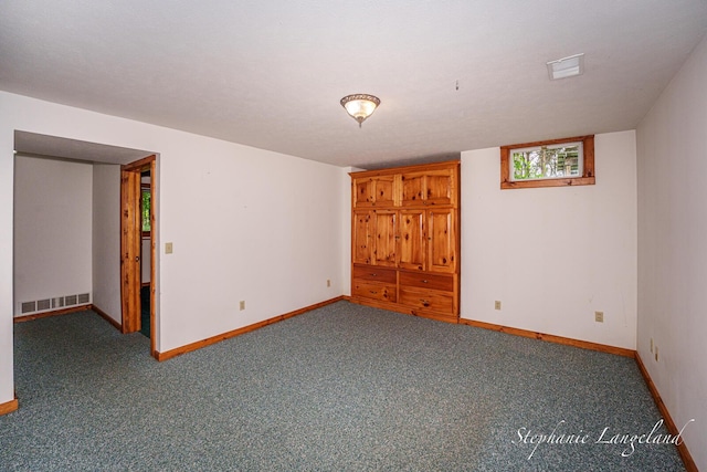 16913 Penny Ave NE, Sand Lake, MI 49343 - empty room featuring baseboards and carpet floors