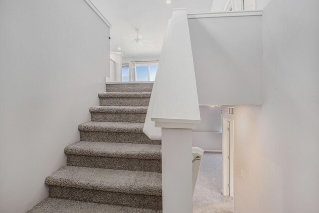 10315 Hatch Ln, Galesburg, MI 49053 - staircase featuring a ceiling fan and carpet