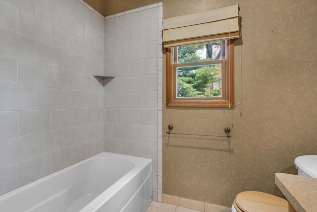 186 Goldsmith Dr, Clarklake, MI 49234 - bathroom featuring toilet, tile patterned flooring, vanity, and shower / washtub combination