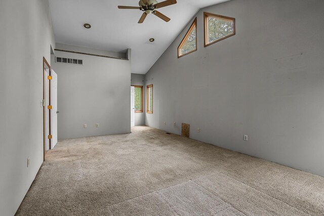 186 Goldsmith Dr, Clarklake, MI 49234 - spare room with high vaulted ceiling, a ceiling fan, and carpet floors