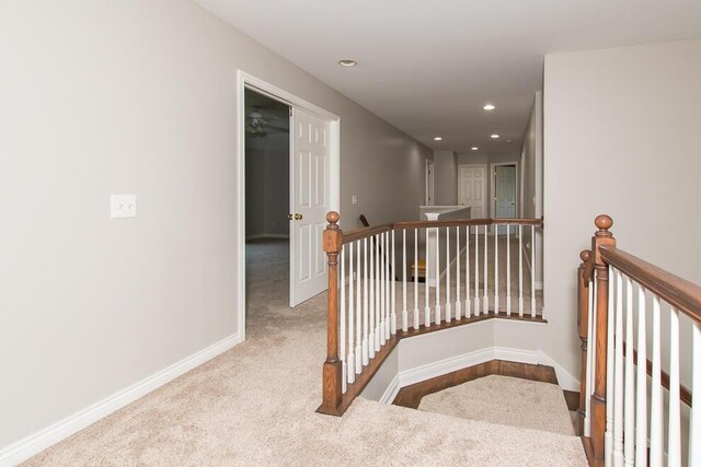 7294 Mackenzie Ln, Portage, MI 49024 - hallway featuring an upstairs landing, carpet, baseboards, and recessed lighting