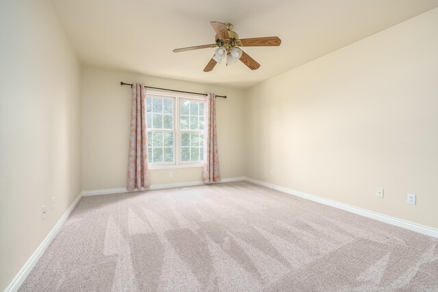 7294 Mackenzie Ln, Portage, MI 49024 - carpeted empty room featuring ceiling fan and baseboards