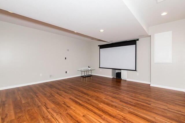 7294 Mackenzie Ln, Portage, MI 49024 - cinema room featuring wood finished floors, baseboards, and recessed lighting