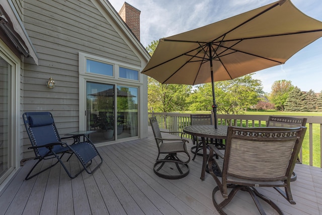 4980 Doral Dr, Ann Arbor, MI 48108 - wooden deck featuring outdoor dining space