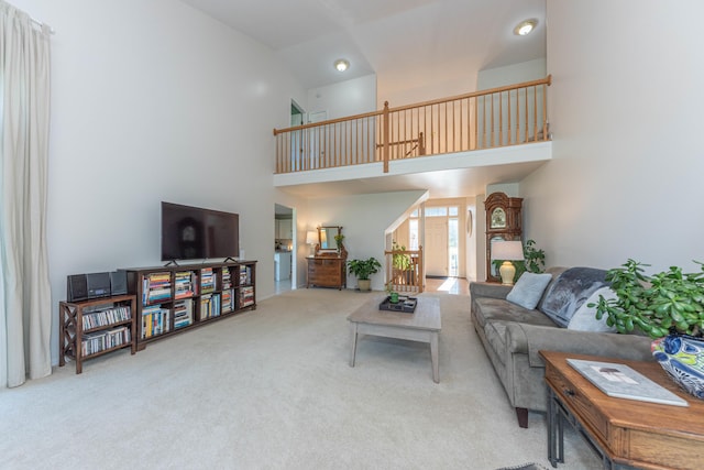 4980 Doral Dr, Ann Arbor, MI 48108 - carpeted living room with high vaulted ceiling
