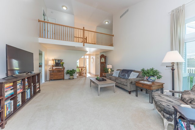 4980 Doral Dr, Ann Arbor, MI 48108 - carpeted living area with a high ceiling