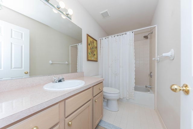 4980 Doral Dr, Ann Arbor, MI 48108 - full bathroom with tile patterned floors, vanity, toilet, and shower / bath combo with shower curtain