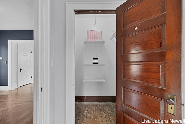 205 N Franklin St, Greenville, MI 48838 - detailed view of baseboards and wood finished floors