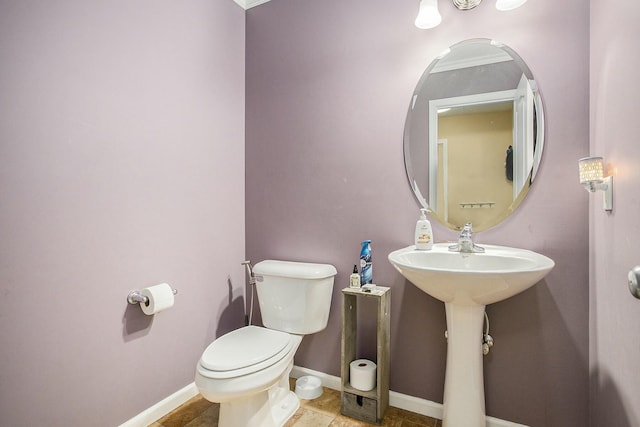 9908 Mariner St, Portage, MI 49002 - half bathroom with toilet and baseboards