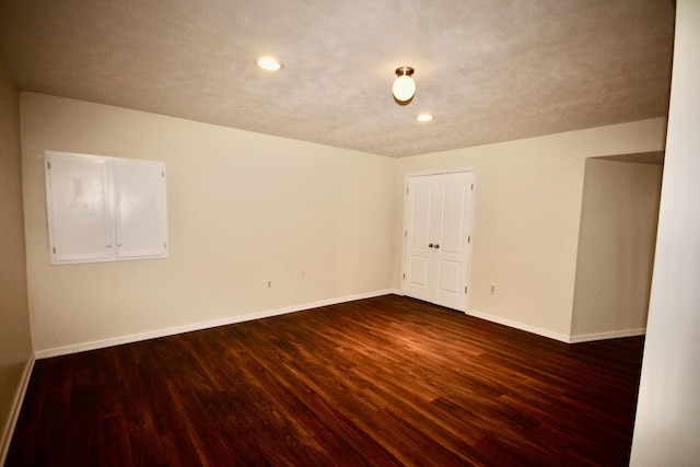 9908 Mariner St, Portage, MI 49002 - unfurnished room with dark wood-style flooring, baseboards, and recessed lighting