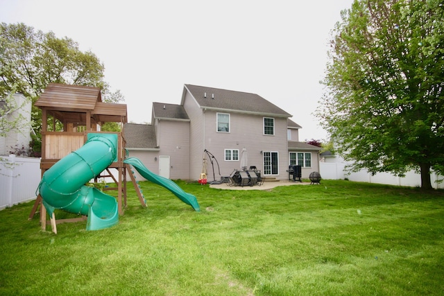 9908 Mariner St, Portage, MI 49002 - back of house with a patio and a playground