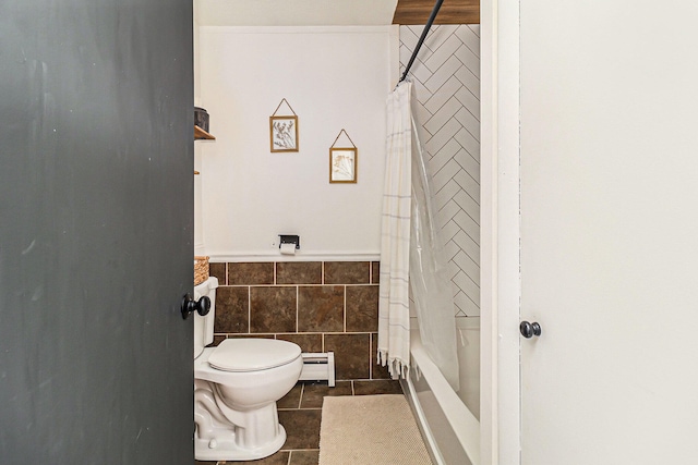 524 S Mears Ave, Whitehall, MI 49461 - full bath with tile walls, toilet, a baseboard radiator, curtained shower, and wainscoting