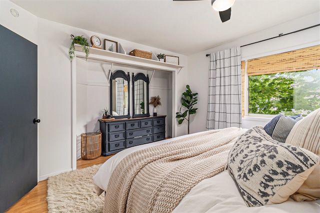 524 S Mears Ave, Whitehall, MI 49461 - bedroom with wood finished floors, a closet, and ceiling fan