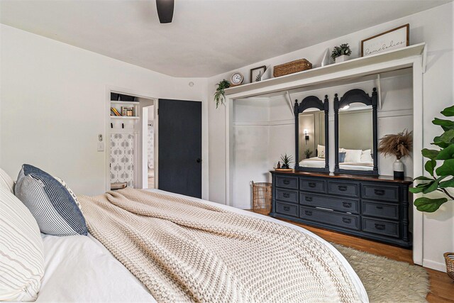 524 S Mears Ave, Whitehall, MI 49461 - bedroom featuring wood finished floors, a closet, a ceiling fan, and baseboards