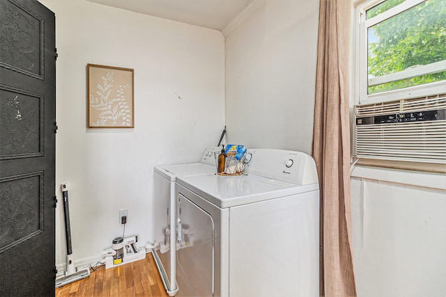 524 S Mears Ave, Whitehall, MI 49461 - washroom with washing machine and clothes dryer, light wood-style flooring, and baseboards
