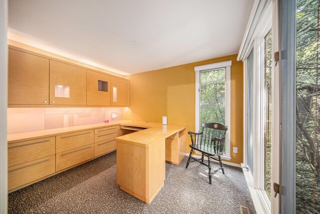 1410 N Folkstone Ct, Ann Arbor, MI 48105 - office with built in study area and baseboards