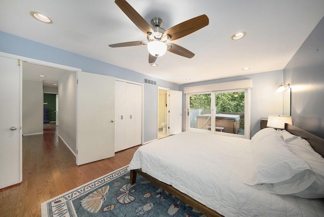 1410 N Folkstone Ct, Ann Arbor, MI 48105 - bedroom with wood finished floors, a ceiling fan, recessed lighting, baseboards, and a closet