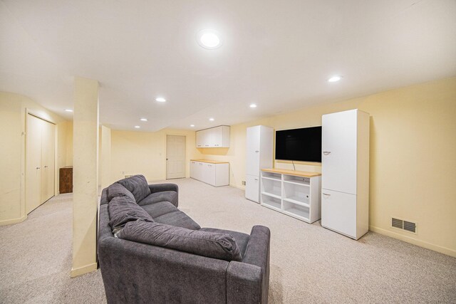 1410 N Folkstone Ct, Ann Arbor, MI 48105 - living room featuring light colored carpet, recessed lighting, and baseboards