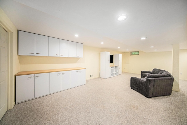 1410 N Folkstone Ct, Ann Arbor, MI 48105 - living area with light colored carpet, recessed lighting, and baseboards