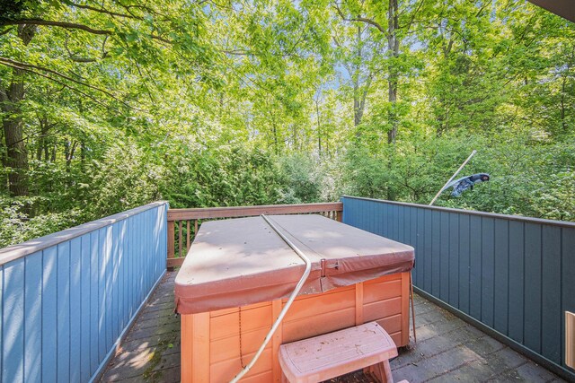 1410 N Folkstone Ct, Ann Arbor, MI 48105 - deck featuring a hot tub