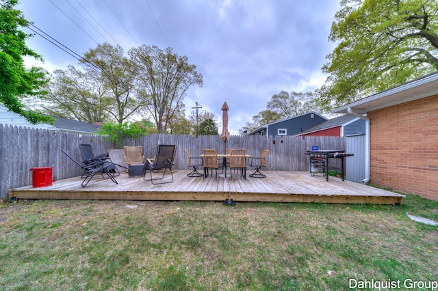 deck with outdoor dining space