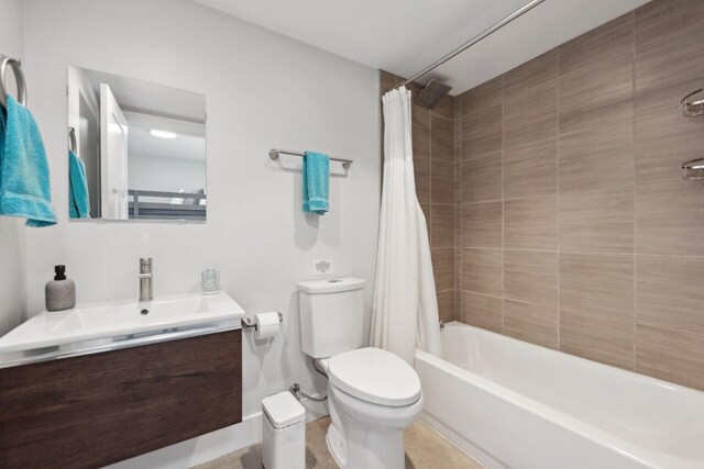 7469 Lake Solis Dr, Stevensville, MI 49127 - bathroom with toilet, shower / bathtub combination with curtain, and vanity