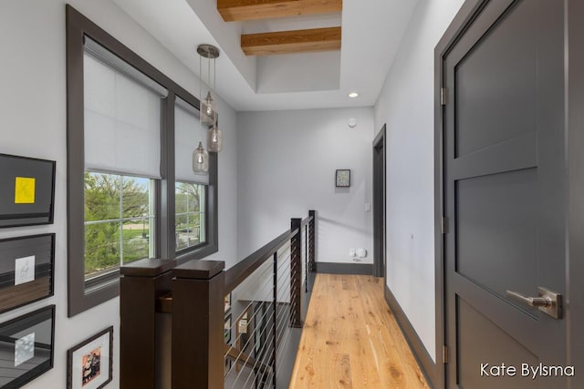 657 Greenslate Dr SE, Ada, MI 49301 - corridor featuring light wood-style floors, recessed lighting, baseboards, and an upstairs landing