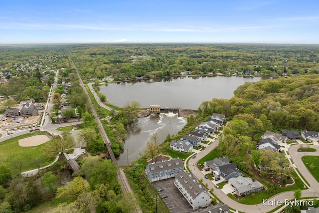 657 Greenslate Dr SE, Ada, MI 49301 - aerial view of property and surrounding area featuring a forest and a nearby body of water
