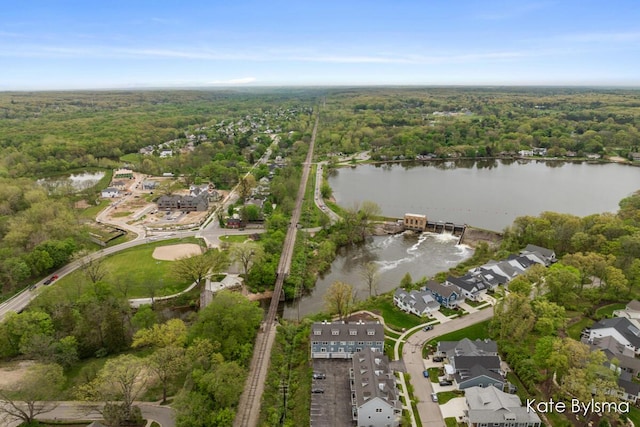 657 Greenslate Dr SE, Ada, MI 49301 - view of property location featuring a heavily wooded area and a large body of water