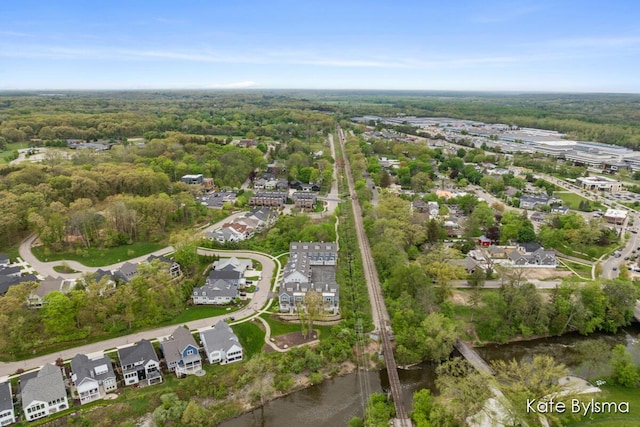 657 Greenslate Dr SE, Ada, MI 49301 - aerial view of property and surrounding area with nearby suburban area and a forest