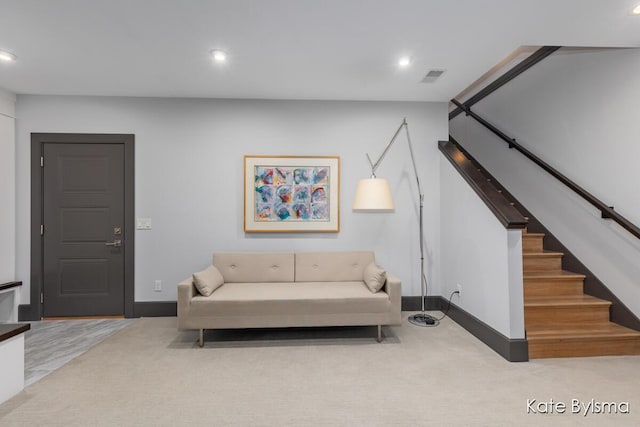 657 Greenslate Dr SE, Ada, MI 49301 - living area with stairs, baseboards, recessed lighting, and carpet floors