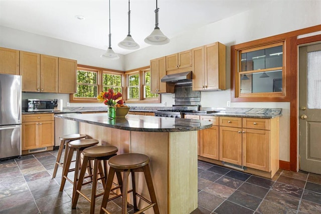 6800 Harbert Rd, Harbert, MI 49115 - kitchen with stainless steel appliances, stone tile flooring, exhaust hood, a kitchen bar, and a kitchen island